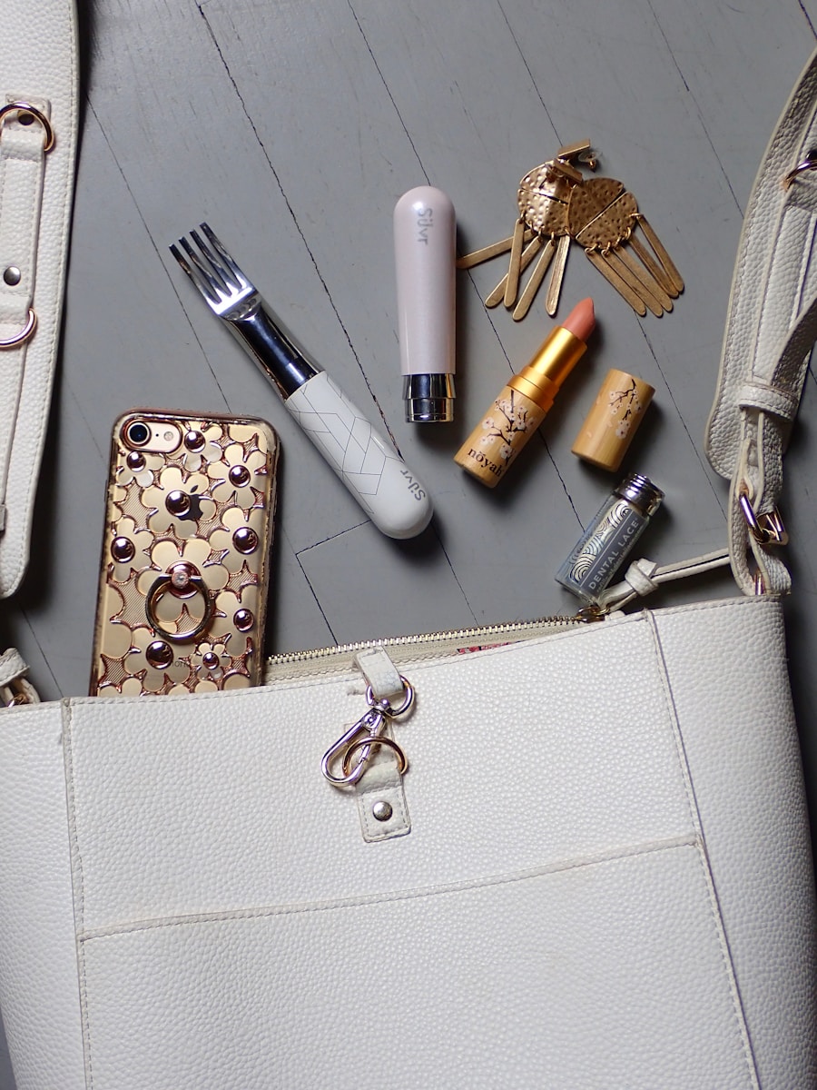 gold and silver padlock on white leather bag