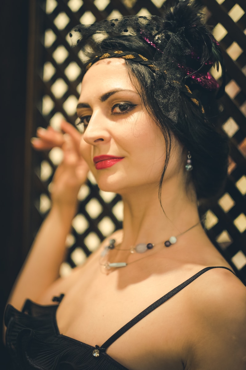 woman in black and white polka dot spaghetti strap top